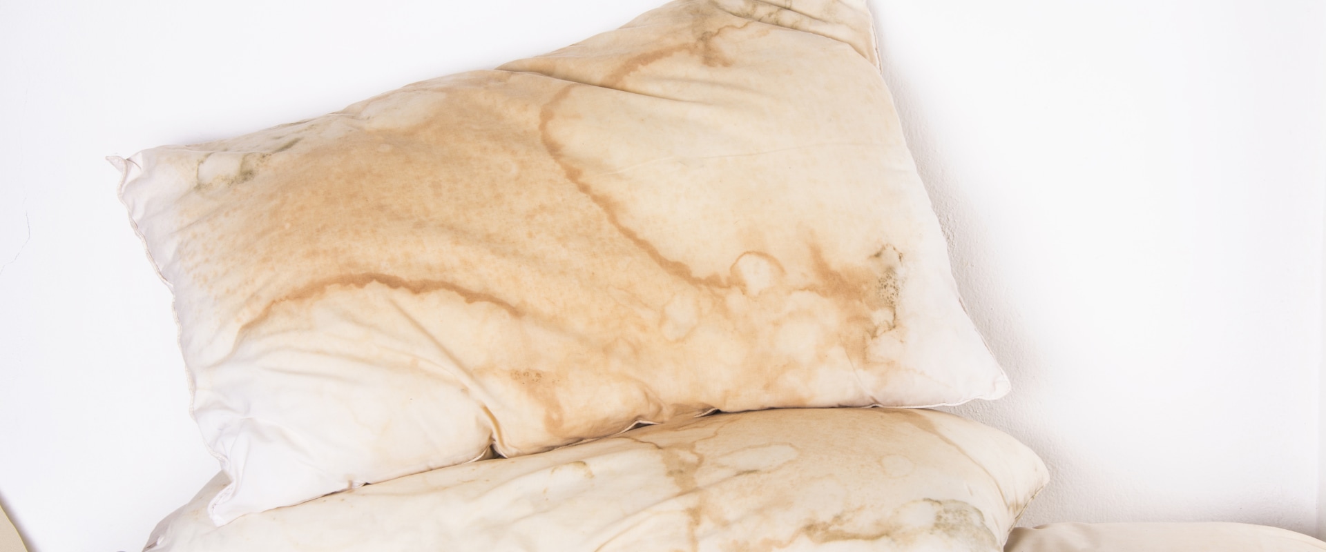How often should you wash your pillows and cushions?
